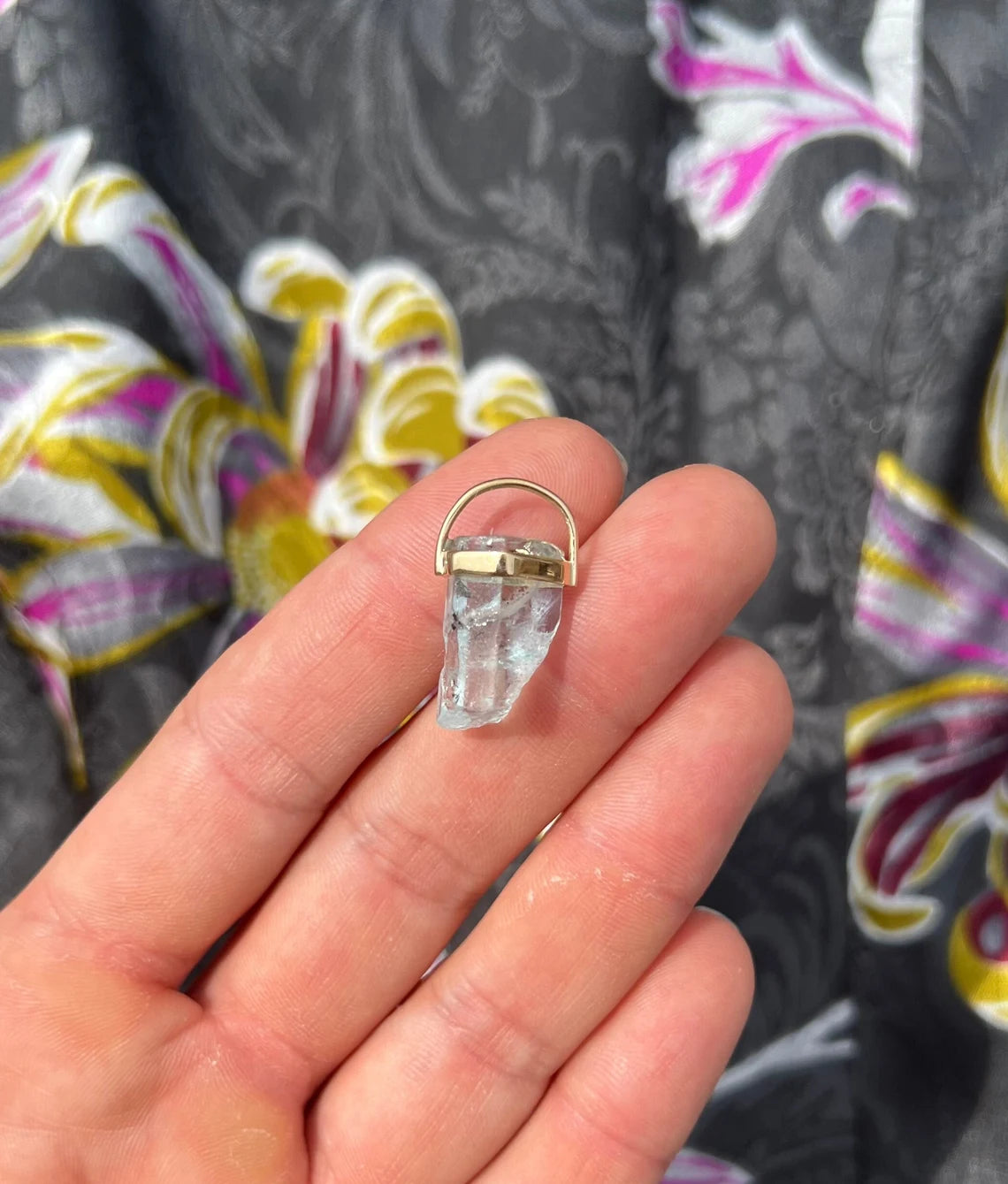 Aquamarine rough crystal pendant set in solid 14k yellow gold