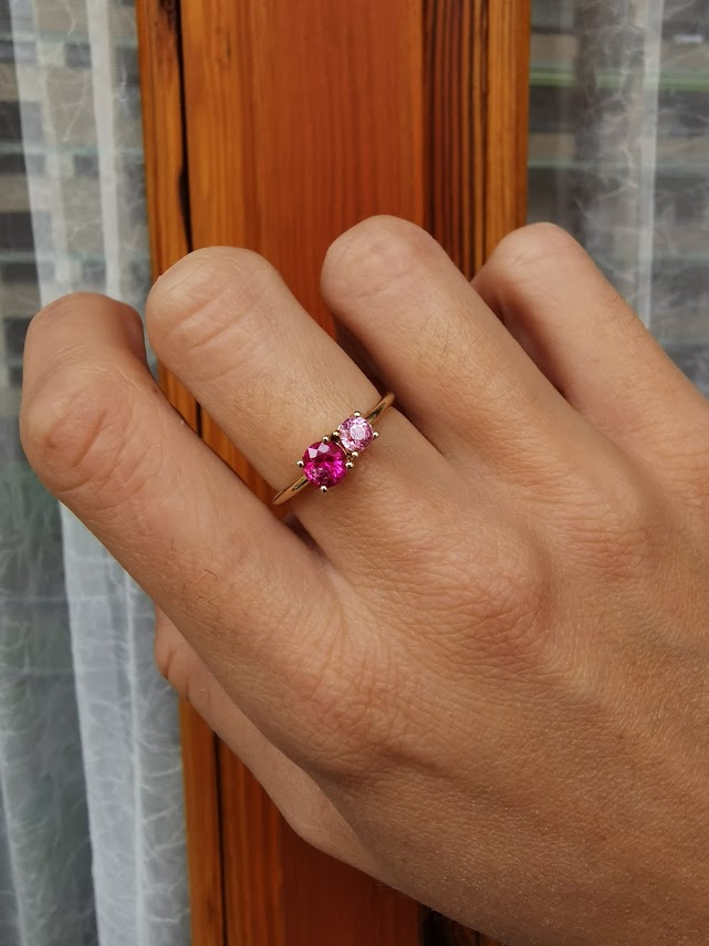 Lico Jewelry 14K yellow gold Baby Fuchsia ring on a woman's hand with bending fingers