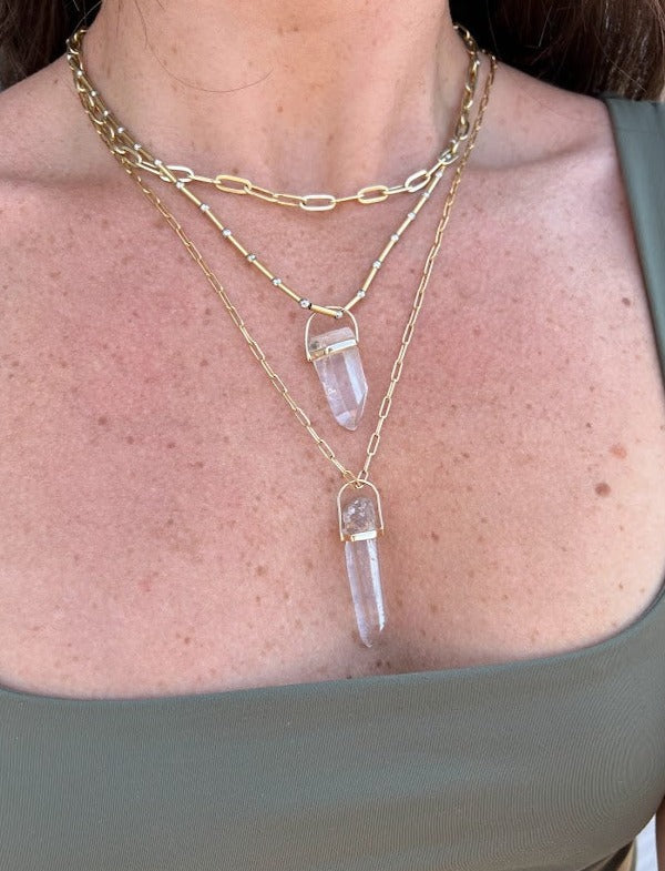 Clear quartz crystal pendant