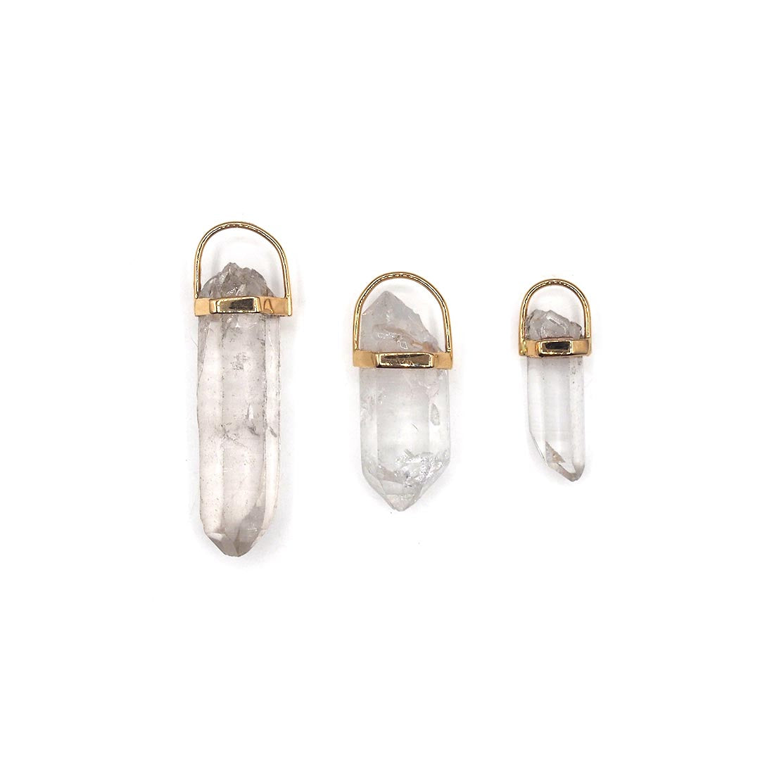 Lico Jewelry Clear Quartz Crystal Pendant, set in 14K yellow gold. Montreal-based company."