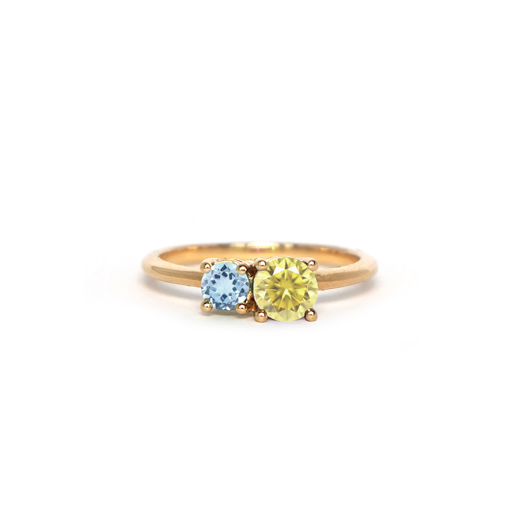 Beautiful 2 stone ring in solid 14k yellow gold with genuine milky yellow sapphire and sky blue topaz by Lico Jewelry.