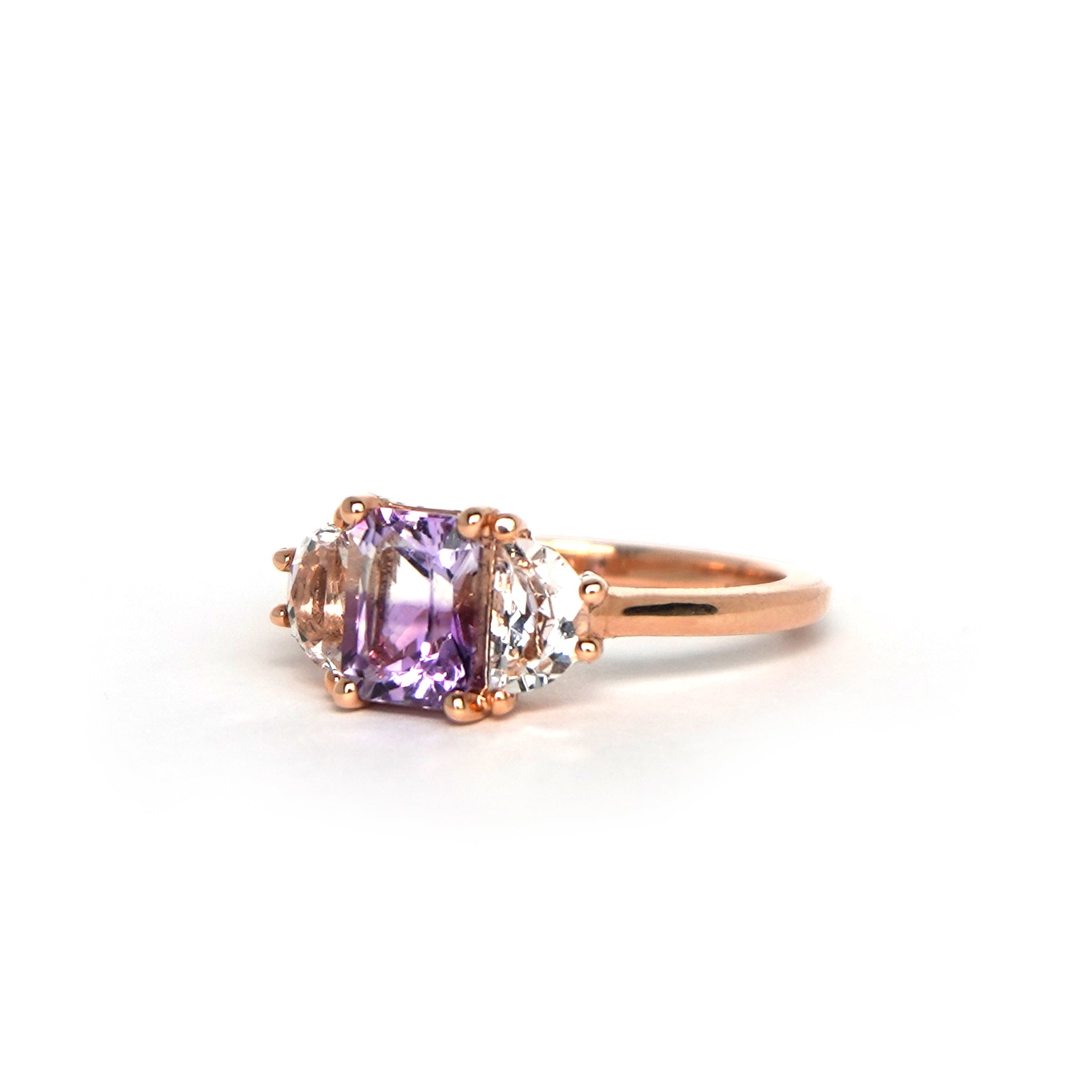 Side view of the Lilac Roots ring showcasing the natural bi-color amethyst and half-moon white topaz stones in rose gold. Custom order now.