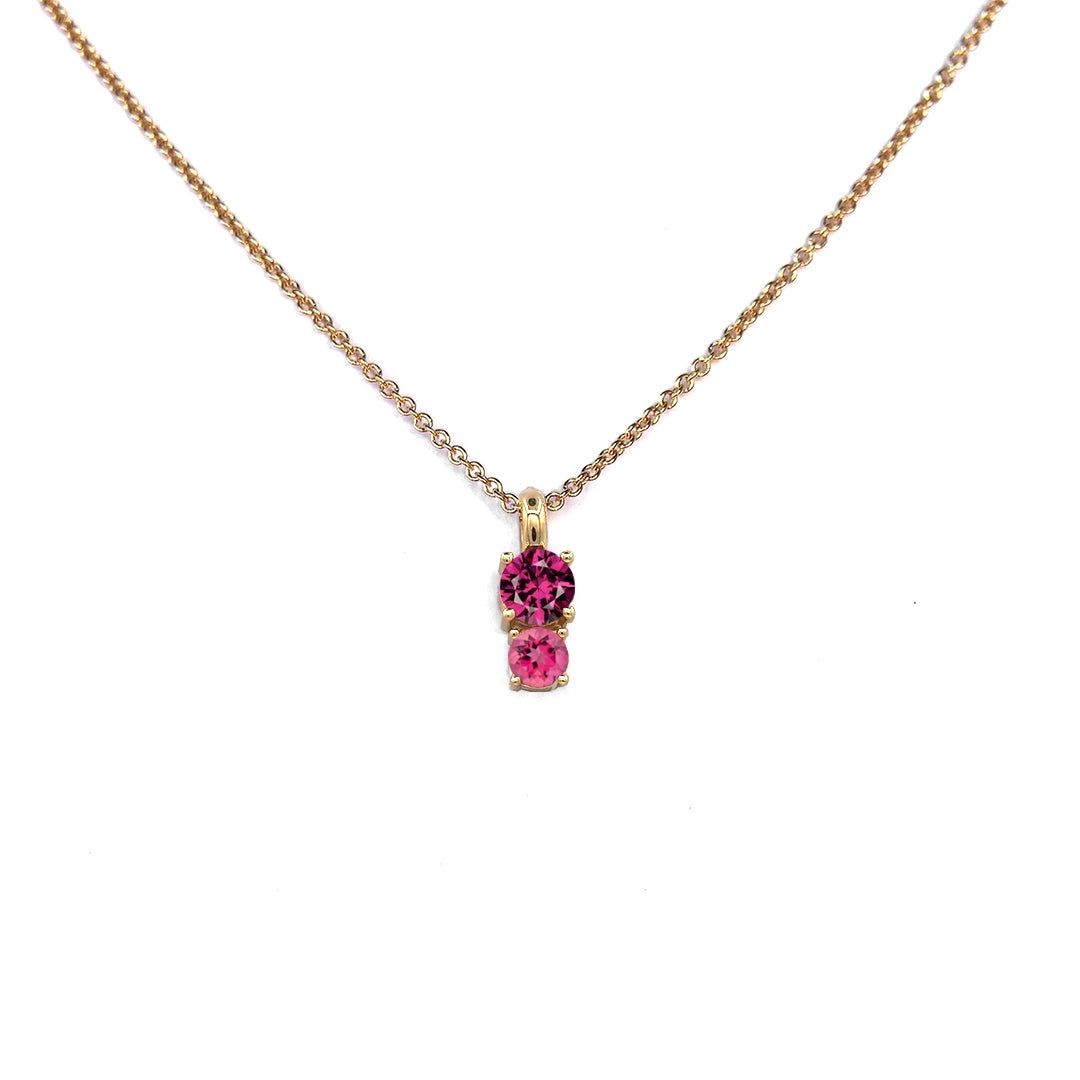 Lico Jewelry's Mulberry Jam Pendant in Solid 14k Yellow Gold with Rhodolite Garnet and Pink Tourmaline on a White Background